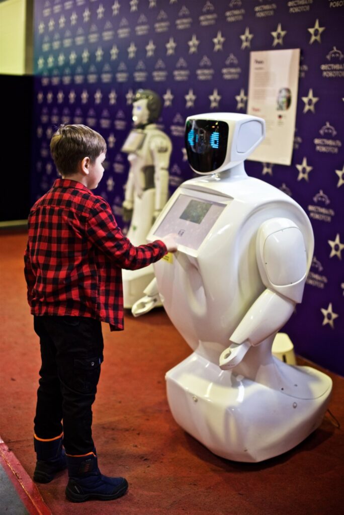 young boy is contacting with the robot 2025 01 08 03 51 46 utc (1)